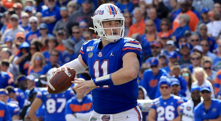Kyle Trask #11 of the Florida Gators attempts a pass during the game against the Vanderbilt Commodores at Ben Hill Griffin Stadium on November 09, 2019 in Gainesville.