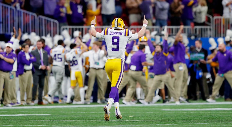 Quarterback Joe Burrow #9 of the LSU Tigers celebrates a 62 yard touchdown over the Oklahoma Sooners during the Chick-fil-A Peach Bowl at Mercedes-Benz Stadium on December 28, 2019 in Atlanta, Georgia.