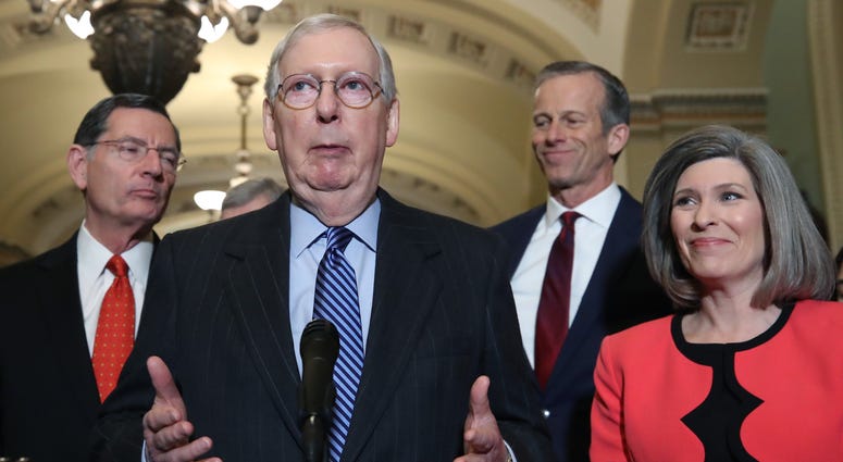 McConnell said he had enough support from his caucus to move forward with the impeachment trial of President Donald Trump. Senate Majority Leader Mitch McConnell (R-KY) (C) talks to reporters after attending the weekly Senate Republicans policy luncheon at the U.S. Capitol January 07, 2020 in Washington, DC.