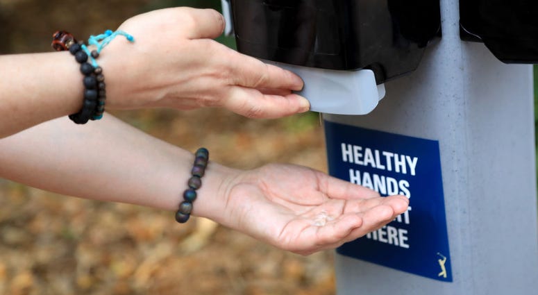 A detail as a fan uses hand sanitizer during a practice round prior to The PLAYERS Championship on The Stadium Course at TPC Sawgrass on March 10, 2020 in Ponte Vedra Beach, Florida.