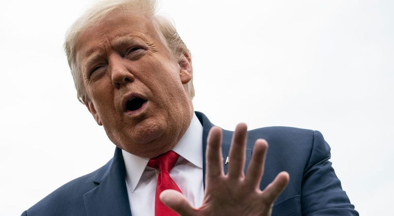 Trump speaks to reporters on his way to Marine One on the South Lawn of the White House on May 14, 2020 in Washington, DC. President Trump is traveling to Allentown, Pennsylvania to visit Owens & Minor, a medical equipment distributor.