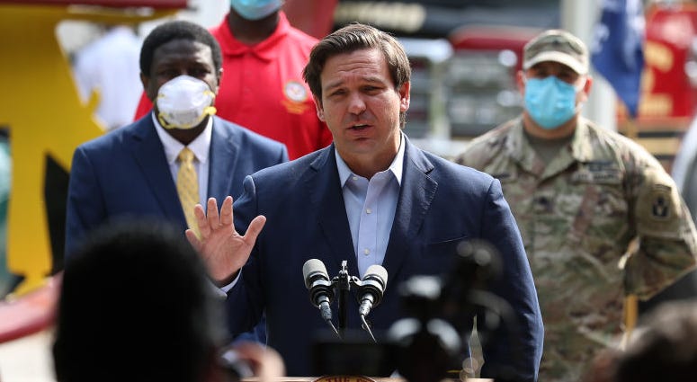Florida Gov. Ron DeSantis gives updates about the state's response to the coronavirus pandemic during a press conference in Fort Lauderdale, Florida.