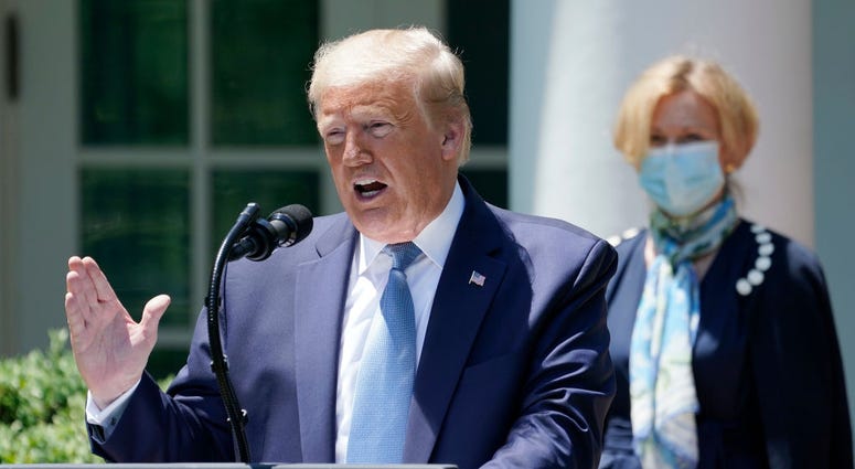 U.S. President Donald Trump is joined by Dr. Deborah Brix, White House coronavirus response coordinator while speaking about coronavirus vaccine development in the Rose Garden of the White House