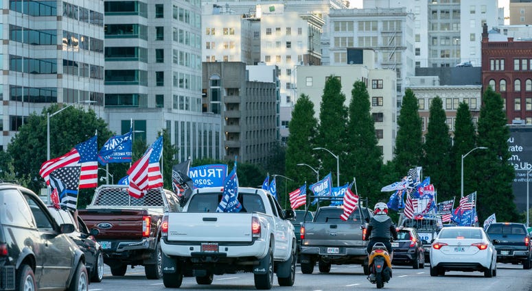 Pro-Trump supporters drive into downtown during a rally in support of the president on August 29, 2020 in Portland, Oregon.