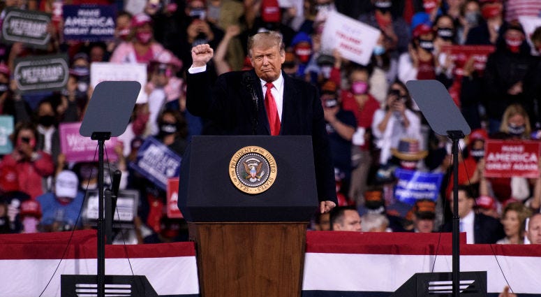 President Donald Trump leaves to cheers from a crowd during a Make America Great Again campaign rally on September 19, 2020 in Fayetteville, North Carolina.