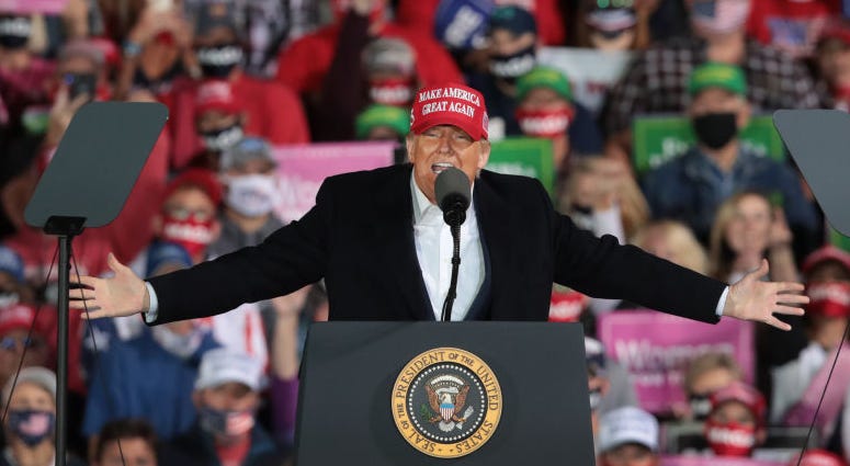 President Donald Trump speaks to supporters during a rally at the Des Moines International Airport on October 14, 2020 in Des Moines, Iowa.