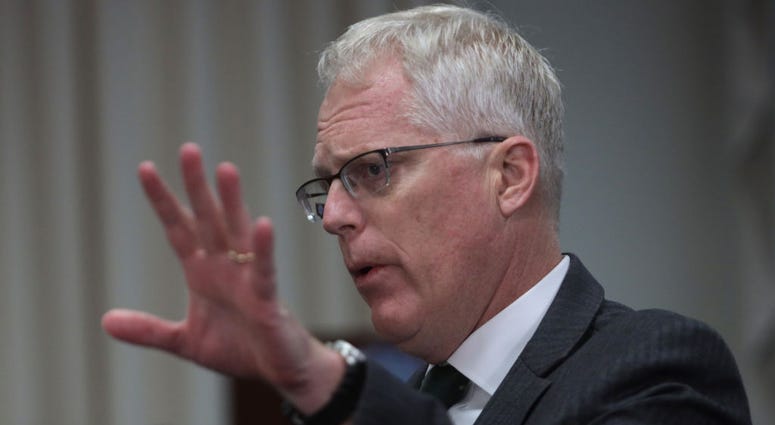Acting U.S. Secretary of Defense Christopher Miller speaks during a meeting
