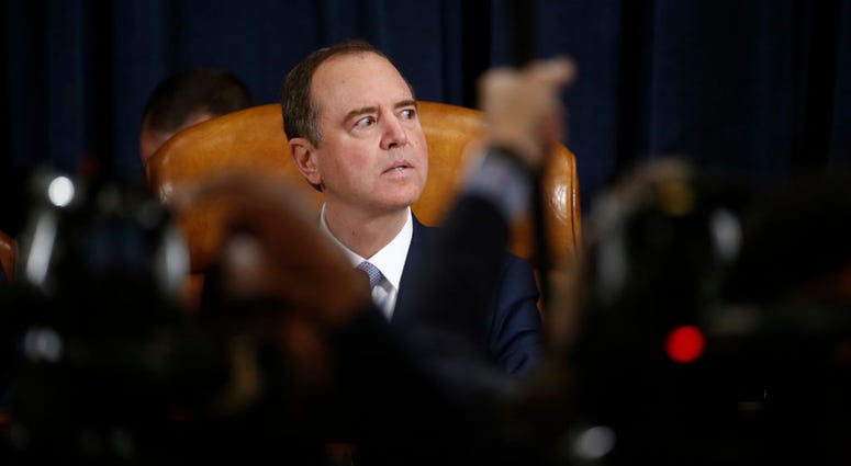 U.S. Rep. Adam Schiff (D-CA) and chairman of the House Intelligence Committee, prepares for a House Intelligence Committee impeachment inquiry hearingon Capitol Hill November 21, 2019 in Washington, DC.