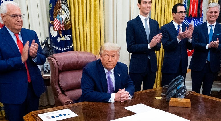 U.S. President Donald Trump leads a meeting with leaders of Israel and UAE announcing a peace agreement to establish diplomatic ties with Israel and the UAE, in the Oval Office of the White House on August 13, 2020 in Washington, DC.