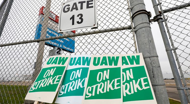 United Auto Workers (UAW) strike signs are shown at a gate at the General Motors Flint Assembly Plant after the UAW declared a national strike against GM at midnight on September 16, 2019 in Flint, Michigan.
