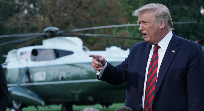 U.S. President Donald Trump speaks to members of the media prior to a departure from the White House September 12, 2019