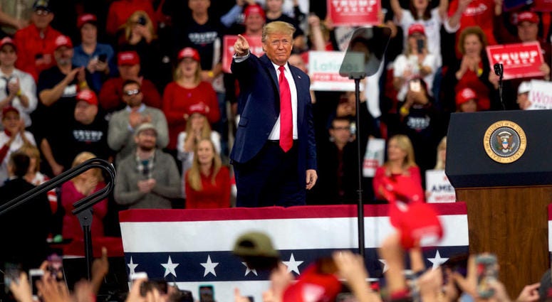President Donald Trump acknowledges the crowd upon taking the stage during a campaign rally on December 10, 2019 in Hershey, Pennsylvania.