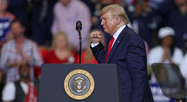President Trump headlined the rally to support Louisiana Republican gubernatorial candidate Eddie Rispone, who is looking to unseat incumbent Democratic Gov. John Bel Edwards. U.S. President Donald Trump gestures during a "Keep America Great" rally at the Monroe Civic Center on November 06, 2019 in Monroe, Louisiana.