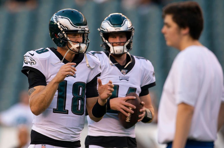 Josh McCown and Carson Wentz Josh McCown #18 of the Philadelphia Eagles and Carson Wentz #11 warm up prior to the preseason game against the Baltimore Ravens at Lincoln Financial Field on August 22, 2019 in Philadelphia, Pennsylvania.