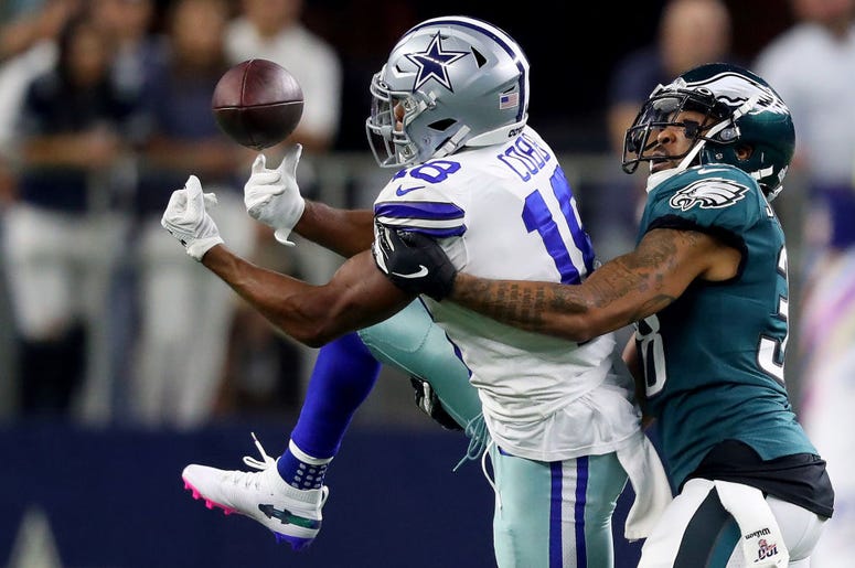 Eagles vs. Cowboys Randall Cobb #18 of the Dallas Cowboys attempts to make a catch against #38 of the Philadelphia Eagles during the first half in the game on October 20, 2019 in Arlington, Texas.