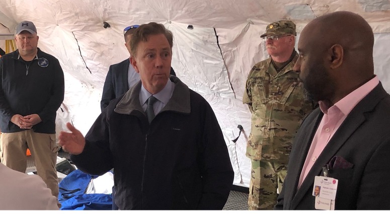 Trinity Heath of NE Pres./CEO Dr. Reggy Eadie (R) w/ Gov. Ned Lamont, 3/24/20 Trinity Heath of NE Pres./CEO Dr. Reggy Eadie (R) w/ Gov. Ned Lamont, 3/24/20