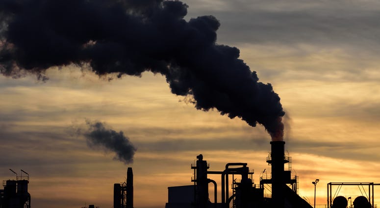 A cloud of pollution released by an industry