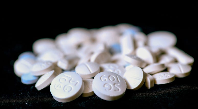 File photo of four different kinds of opioid pills. © Lacy Atkins / The Tennessean