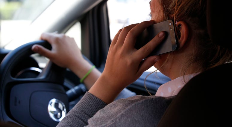 Driver Using Cell Phone Driver Using Cell Phone