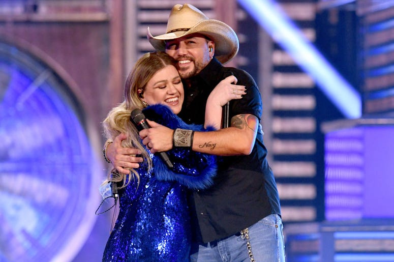 Kelly Clarkson and Jason Aldean perform onstage during the 54th Academy Of Country Music Awards at MGM Grand Garden Arena on April 07, 2019 in Las Vegas, Nevada. Kelly Clarkson and Jason Aldean perform onstage during the 54th Academy Of Country Music Awards at MGM Grand Garden Arena on April 07, 2019 in Las Vegas, Nevada.