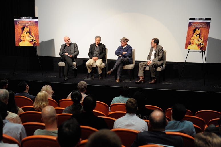 Moderator Joe Neumaier, director Ang Lee, screenwriter James Schamus and Co-President and Co-Founder of Sony Pictures Classics Michael Barker speak on stage at the 'Crouching Tiger, Hidden Dragon' Q&A celebrating the 4K Ultra HD release of the film at Cro Moderator Joe Neumaier, director Ang Lee, screenwriter James Schamus and Co-President and Co-Founder of Sony Pictures Classics Michael Barker speak on stage at the 'Crouching Tiger, Hidden Dragon' Q&A celebrating the 4K Ultra HD release of the film at Cro
