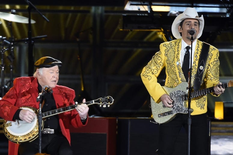 Roy Clark and Brad Paisley perform during the 50th Country Music Association Awards at Bridgestone Arena. Roy Clark and Brad Paisley perform during the 50th Country Music Association Awards at Bridgestone Arena.