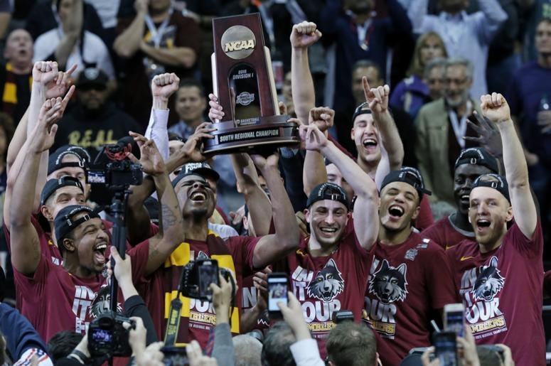 Loyola Ramblers celebrate their 78-62 win Loyola Ramblers