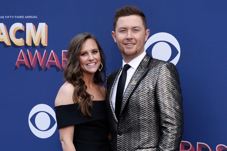 Gabi Dugal and Scotty McCreery pose on the red carpet as they arrive for the 53rd Academy Of Country Music Awards on Sunday, April 15, 2018, in Las Vegas. Gabi Dugal (McCreery) and Scotty McCreery