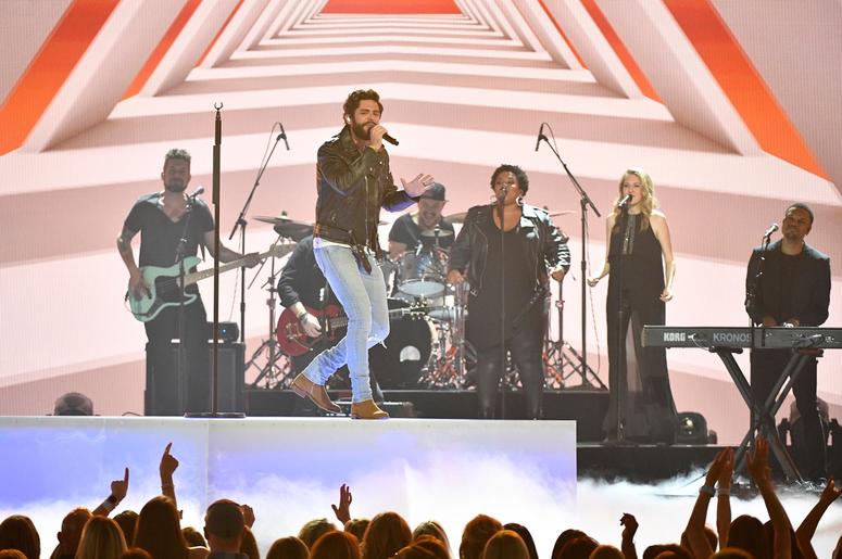 Thomas Rhett performs during the 2019 ACM Awards. Thomas Rhett performs during the 2019 ACM Awards.