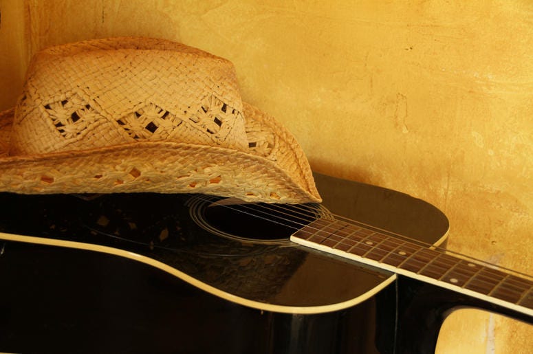 Cowboy Hat and Guitar Cowboy Hat and Guitar