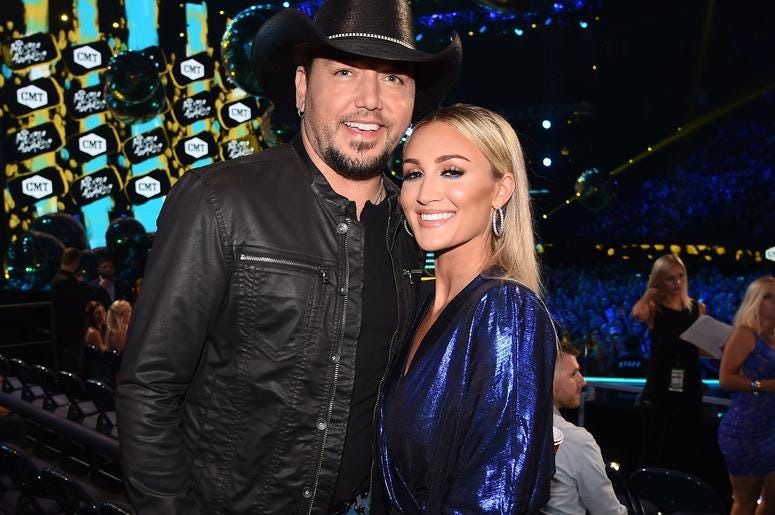 Jason Aldean and Brittany Kerr Aldean attend the 2018 CMT Music Awards at the Bridgestone Arena on June 6, 2018 in Nashville, Tennessee. Jason Aldean & Brittany Aldean at the 2018 CMT Music Awards