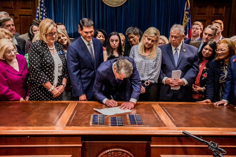 Georgia Governor Brian Kemp signs bill banning abortions after 6 weeks. Georgia Governor Brian Kemp signs bill banning abortions after 6 weeks.
