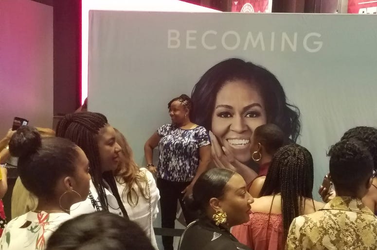 There were long lines to buy merchandise and to photos with a likeness of former first lady Michelle Obama. There were long lines to buy merchandise and to photos with a likeness of former first lady Michelle Obama.