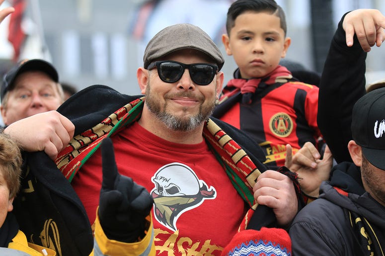 Atlanta United fans celebrate during victory parade Atlanta United fans celebrate during victory parade