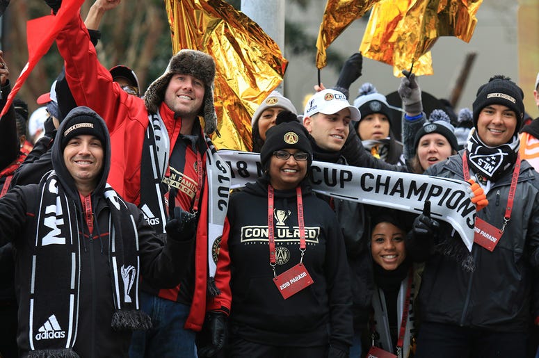 Atlanta United fans celebrate during victory parade Atlanta United fans celebrate during victory parade