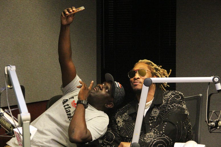 Greg Street and Future take a selfie together at V-103 Atlanta on October 18, 2018 Greg Street and Future take a selfie together at V-103 Atlanta on October 18, 2018