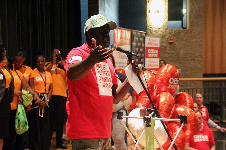 Greg Street talks to Langston Hughes High School students Greg Street talks to Langston Hughes High School students
