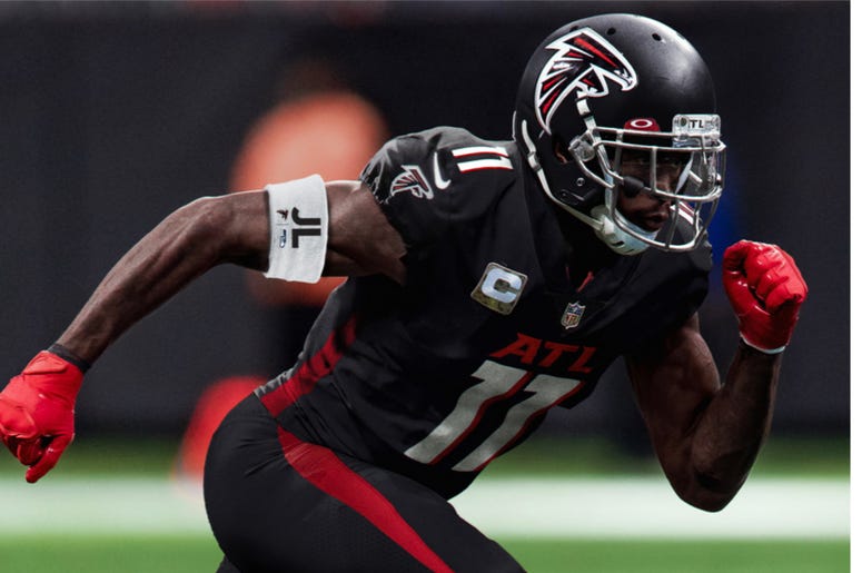 The Atlanta Falcons honored late Congressman John Lewis by wearing white armbands with his initials