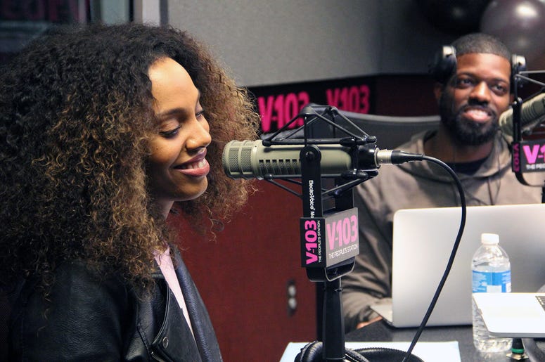 Jade Novah and JR of The Morning Culture smile during their first day on-air at V-103 Jade Novah and JR of The Morning Culture smile during their first day on-air at V-103