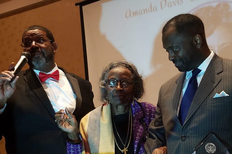 Mrs.Juanita Abernathy is flanked by Fulton County Commissioner Michael Lankford (l) and her son Kwame Abernathy (r) during award presentation in February 2019 Mrs.Juanita Abernathy is flanked by Fulton County Commissioner Michael Lankford (l) and her son Kwame Abernathy (r) during award presentation in February 2019