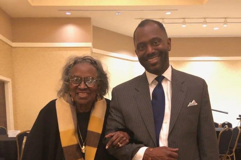 Mrs. Juanita Abernathy is seen being escorted by her son Kwame on Feb. 16, 2019 during a Black History program in Morrow GA Mrs. Juanita Abernathy is seen being escorted by her son Kwame on Feb. 16, 2019 during a Black History program in Morrow GA