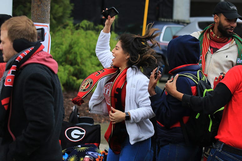 Atlanta United fans celebrate during victory parade Atlanta United fans celebrate during victory parade
