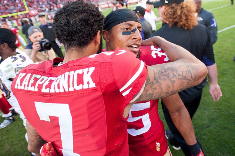 Colin Kaepernick hugs Eric Reid Colin Kaepernick hugs Eric Reid