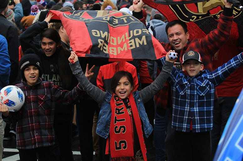 Atlanta United fans celebrate during victory parade Atlanta United fans celebrate during victory parade