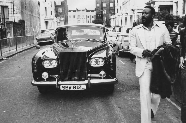 6th October 1976: American soul singer Marvin Gaye (1939 - 1984) walking ahead of his Rolls Royce in Notting Hill, London 6th October 1976: American soul singer Marvin Gaye (1939 - 1984) walking ahead of his Rolls Royce in Notting Hill, London