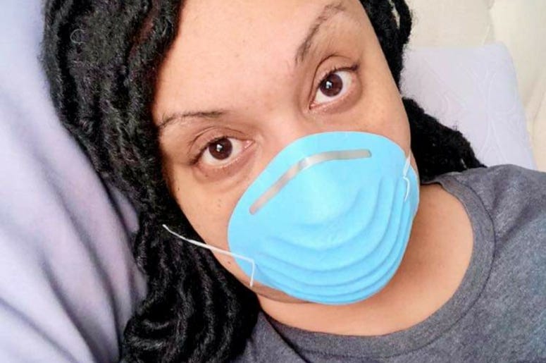 Ga State Senator Nikema Williams wears a mask as she has self-quarantined following exposure to the coronavirus Ga State Senator Nikema Williams wears a mask as she has self-quarantined following exposure to the coronavirus