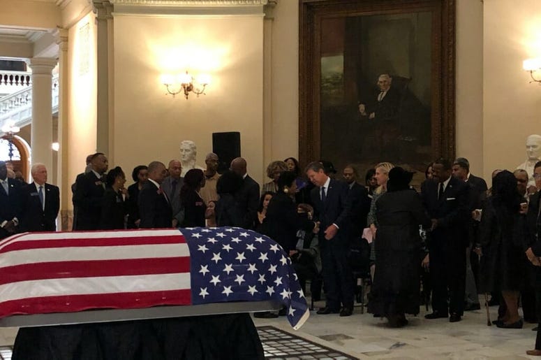 The flag draped coffin of former GA State Senator Leroy Johnson sits inside the Capitol rotunda The flag draped coffin of former GA State Senator Leroy Johnson sits inside the Capitol rotunda