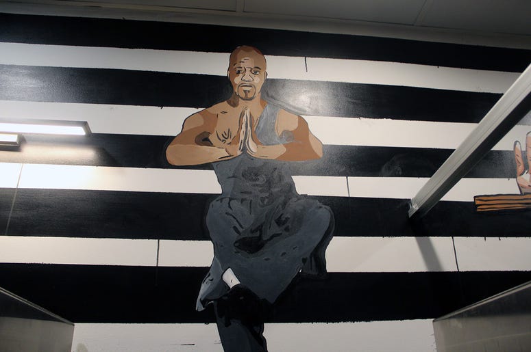 A mural of Jermaine Dupri in the men's restroom at Slim & Husky's in Atlanta A mural of Jermaine Dupri in the men's restroom at Slim & Husky's in Atlanta