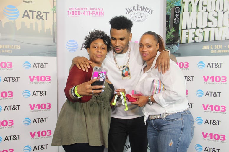Trey Songz takes a photo with fans Trey Songz takes a photo with fans
