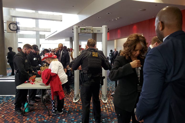 Trump supporters took their turn through security Friday for his Atlanta visit Trump supporters took their turn through security Friday for his Atlanta visit